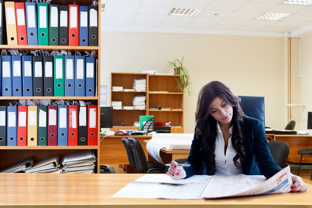 Entrepreneur analyzing business information to make a decision