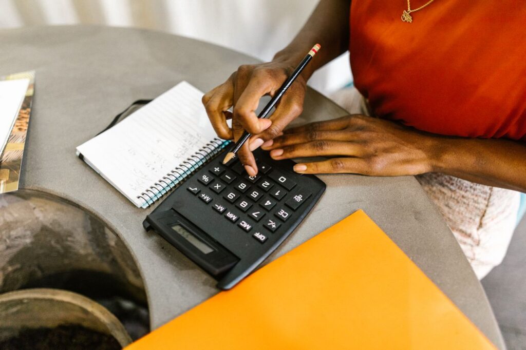 entrepreneur managing finances while bootstrapping a startup