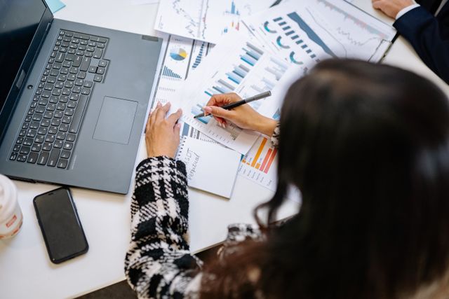 Entrepreneur reviewing startup finances and business growth plans