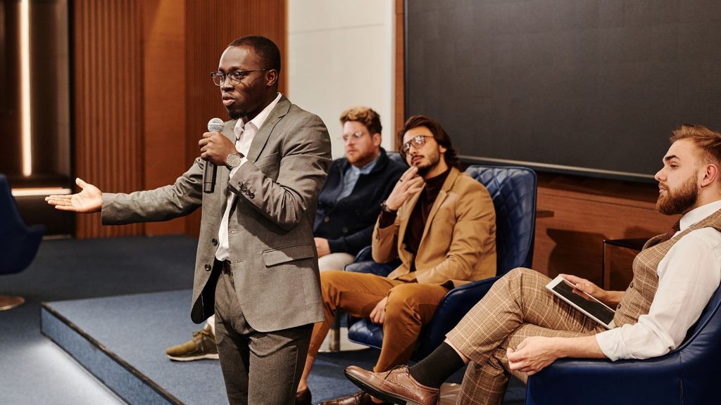Entrepreneur networking with potential customers at a business event